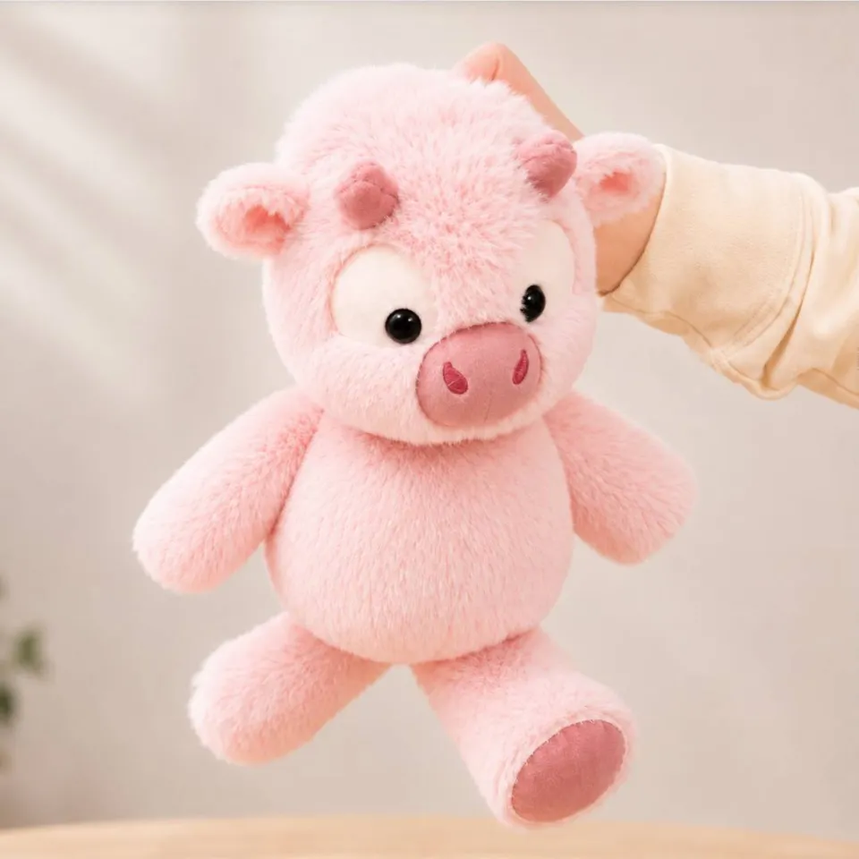 Peluche vache qui court