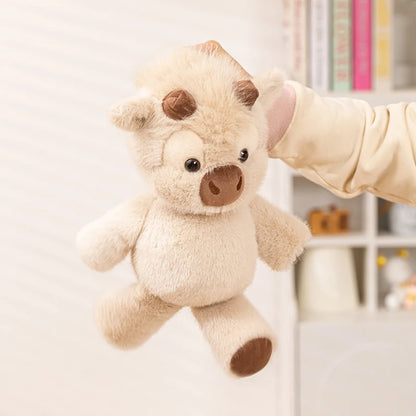 Peluche vache qui court